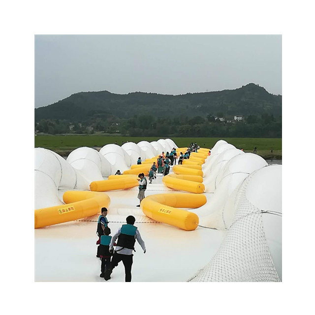 九龙坡蹦床桥农庄游乐场景区新的项目新款充气蹦床桥制作厂家热门